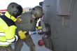 Tlakové plnenie vrtužníka UH-60M počas chodu motorov - Hot Refueling